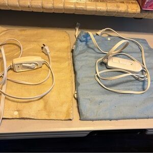 Electric Heating Pads with Controllers - Cream and Blue. Both together